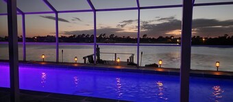 Tranquil Waterfront Pool Home with beautiful views and sunsets and great fishing