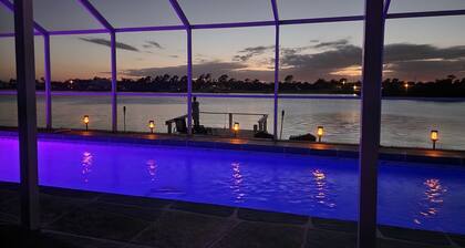 Tranquil Waterfront Pool Home with beautiful views and sunsets and great fishing
