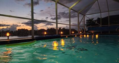 Tranquil Waterfront Pool Home with beautiful views and sunsets and great fishing