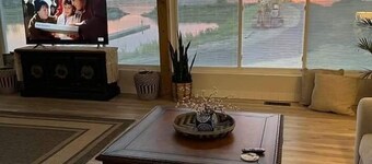 Enjoy Sunsets in a enclosed Jacuzzi in any weather!