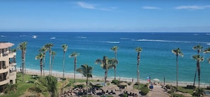 On the beach, sun-loungers, beach towels