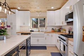 Fridge, microwave, oven, stovetop - Chic Big Bear Cabin: Hot Tub, Game Room, Fire Pit (Big Bear)