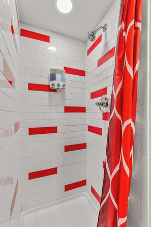 Combined shower/tub, hair dryer, towels, soap