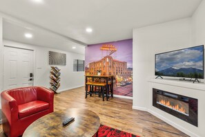 Smart TV, fireplace, books, music library - Downtown Ruby Red Bungalow w/AC, Fully Fenced Yard, W/D, 2 Smart TVs, Fast WiFi (Flagstaff)