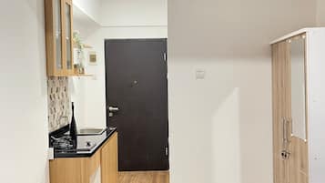Studio | Desk, bed sheets