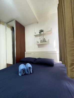 Apartment, 2 Bedrooms | Desk, bed sheets - High Livin Apartment Asia Afrika (Bandung)