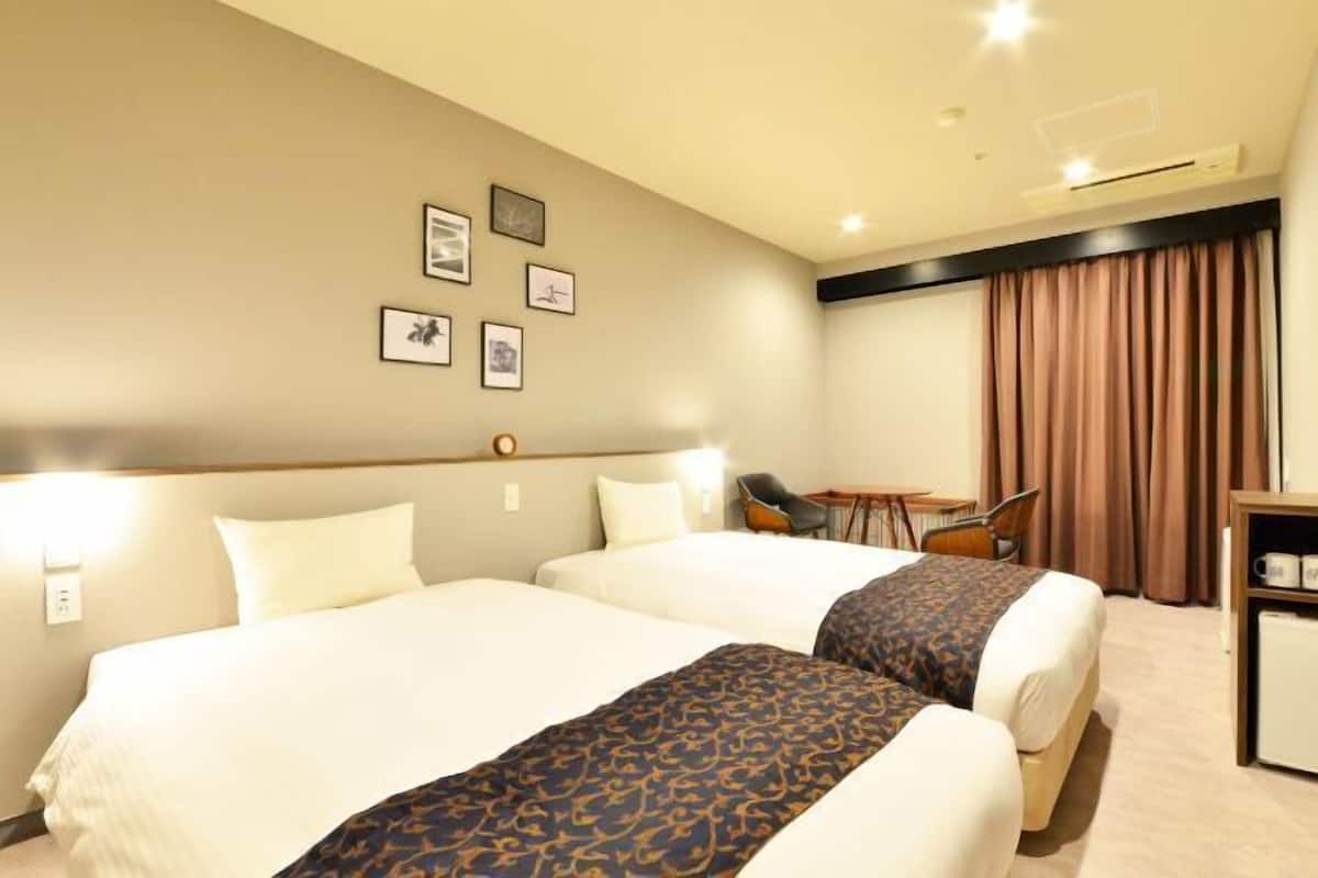 Down duvets, blackout curtains, free WiFi, bed sheets