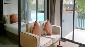 Appartamento, 2 camere da letto, balcone, vista piscina | Area soggiorno