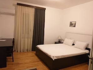 Desk, free WiFi, bed sheets
