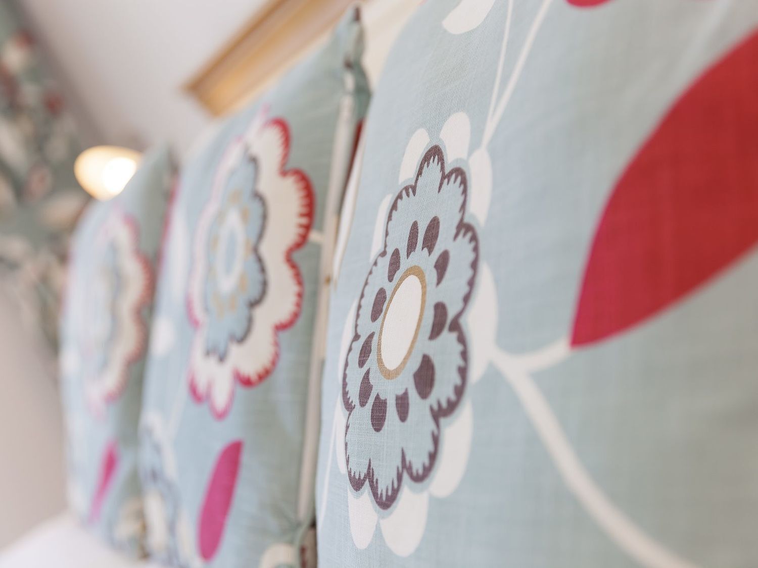 A close-up of a patterned fabric with floral designs.