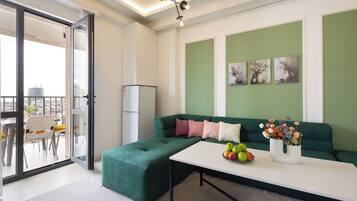 Deluxe Apartment | Living area | 1-inch flat-screen TV with cable channels, TV