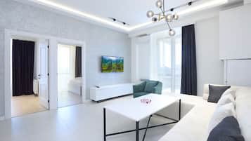Deluxe Apartment | Living area | 1-inch flat-screen TV with cable channels, TV