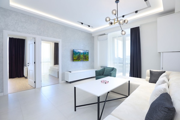 Deluxe Apartment | Living area | 1-inch flat-screen TV with cable channels, TV