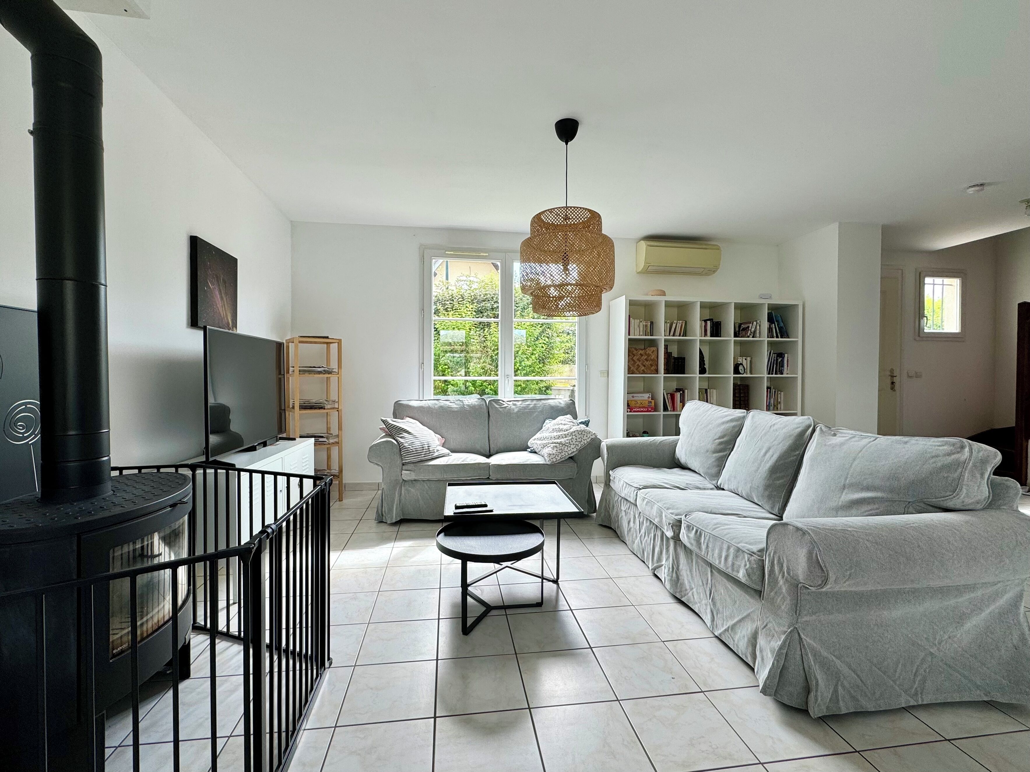 Smart TV, fireplace, books