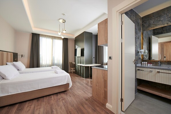 Deluxe Corner With Kitchen Room | Minibar, desk, laptop workspace, soundproofing - Livinton Hotel (Istanbul)