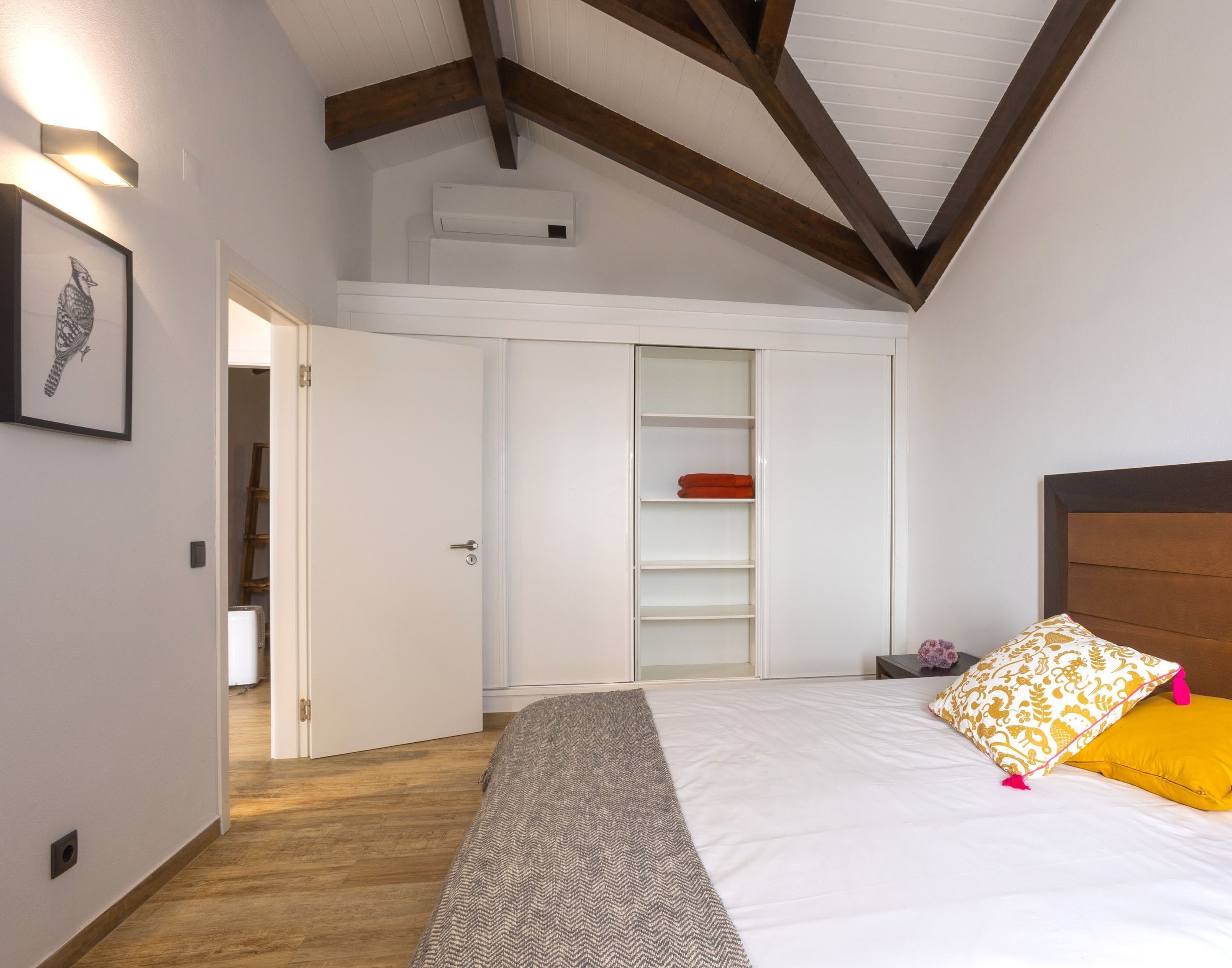 Premium bedding, blackout curtains, soundproofing, iron/ironing board