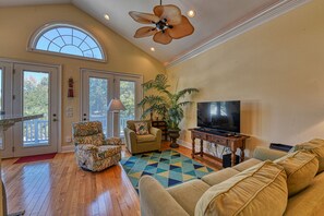 TV - Coastal Charm: Explore, & Relax in our 4 Bedroom Home with Private Pool (Garden City Beach)