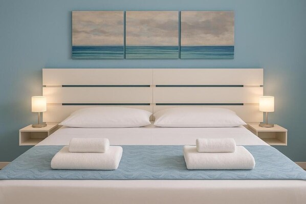 Comfort Room, Balcony | Individually furnished, desk, laptop workspace, WiFi