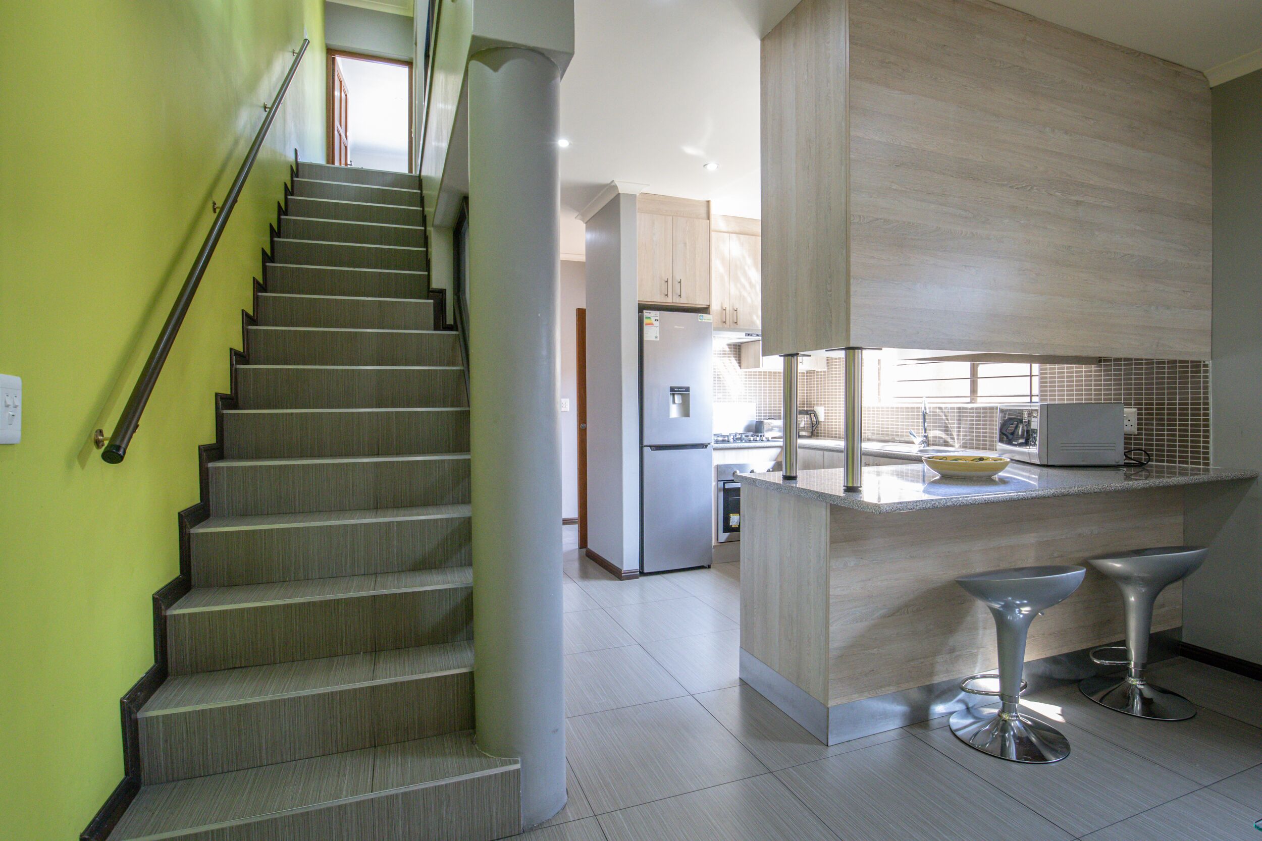 Casa Confort | Área de sala de estar | Televisión de 32 pulgadas con canales digitales y Netflix 