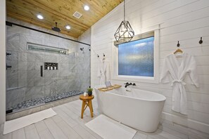 Bathtub, hair dryer, towels, soap