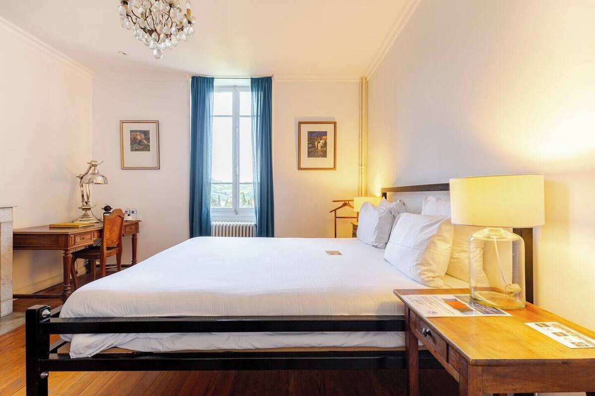 Premium bedding, pillow-top beds, desk, laptop workspace
