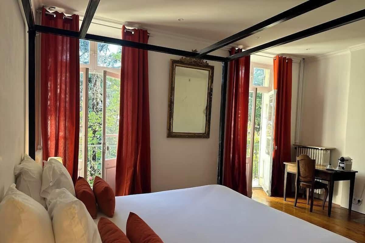 Premium bedding, pillow-top beds, desk, laptop workspace