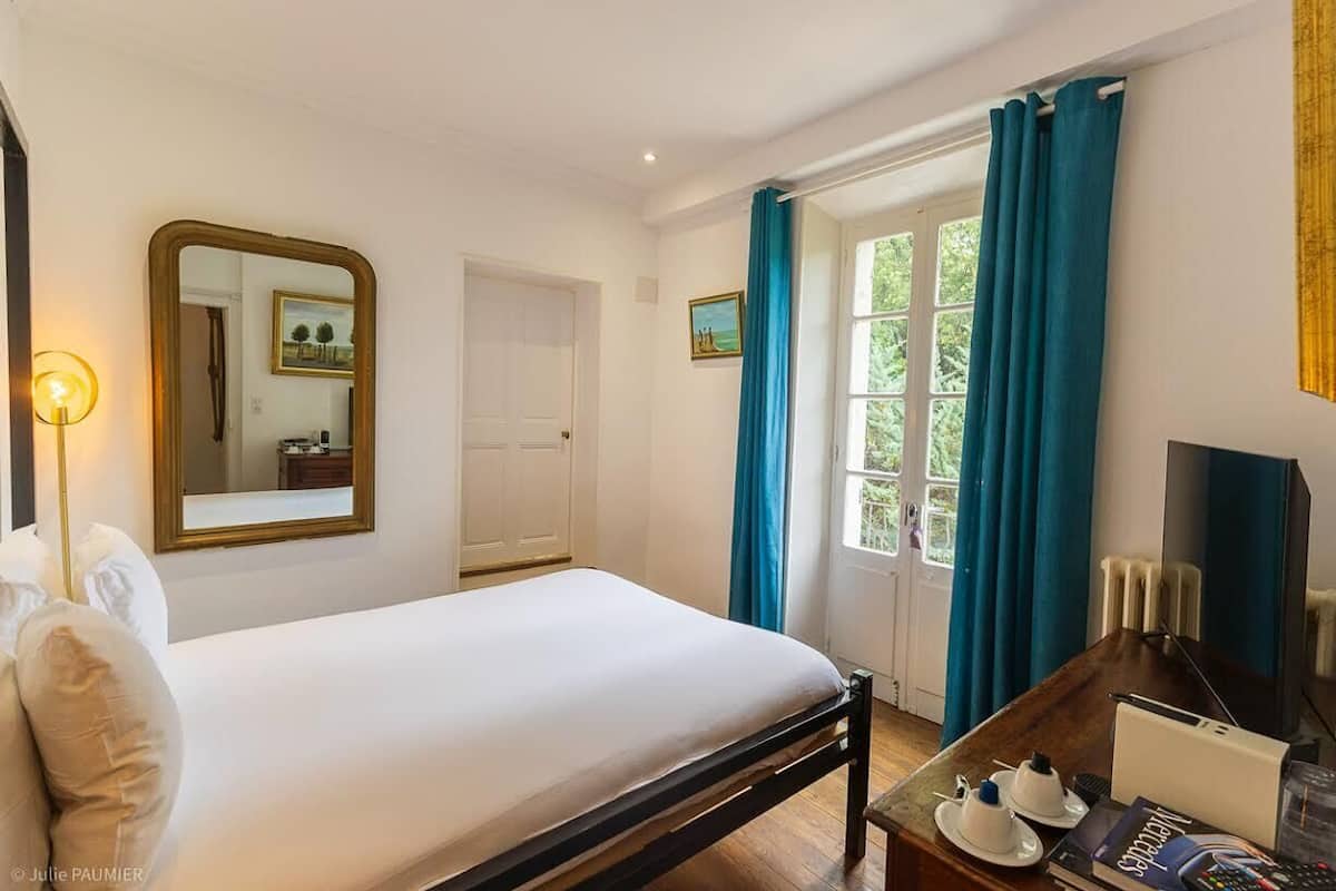 Premium bedding, pillow-top beds, desk, laptop workspace