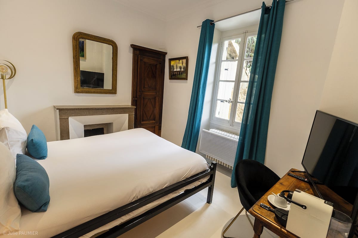 Premium bedding, pillow-top beds, desk, laptop workspace