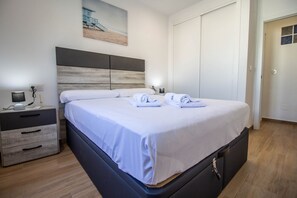 1 dormitori, planxa i posts de planxar, wifi gratuïta i roba de llit