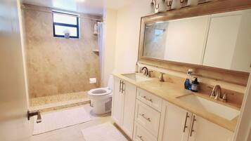 Shower, hair dryer, towels, soap