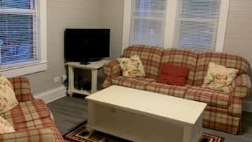 Smart TV, fireplace, books