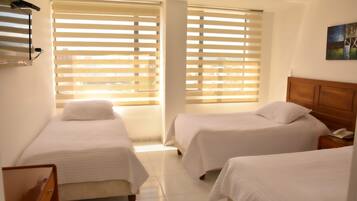 Family Room | 1 bedroom, premium bedding, down comforters, in-room safe