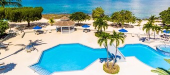 The Grandest of Grandviews on 7 Mile Beach!  2nd floor 2 bed-2 bath beachfront!