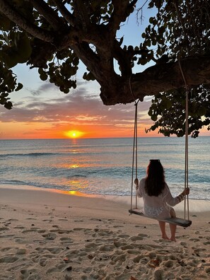 On the beach, sun-loungers, beach towels