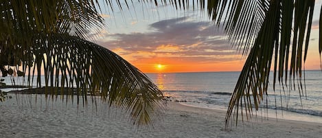 On the beach, sun-loungers, beach towels