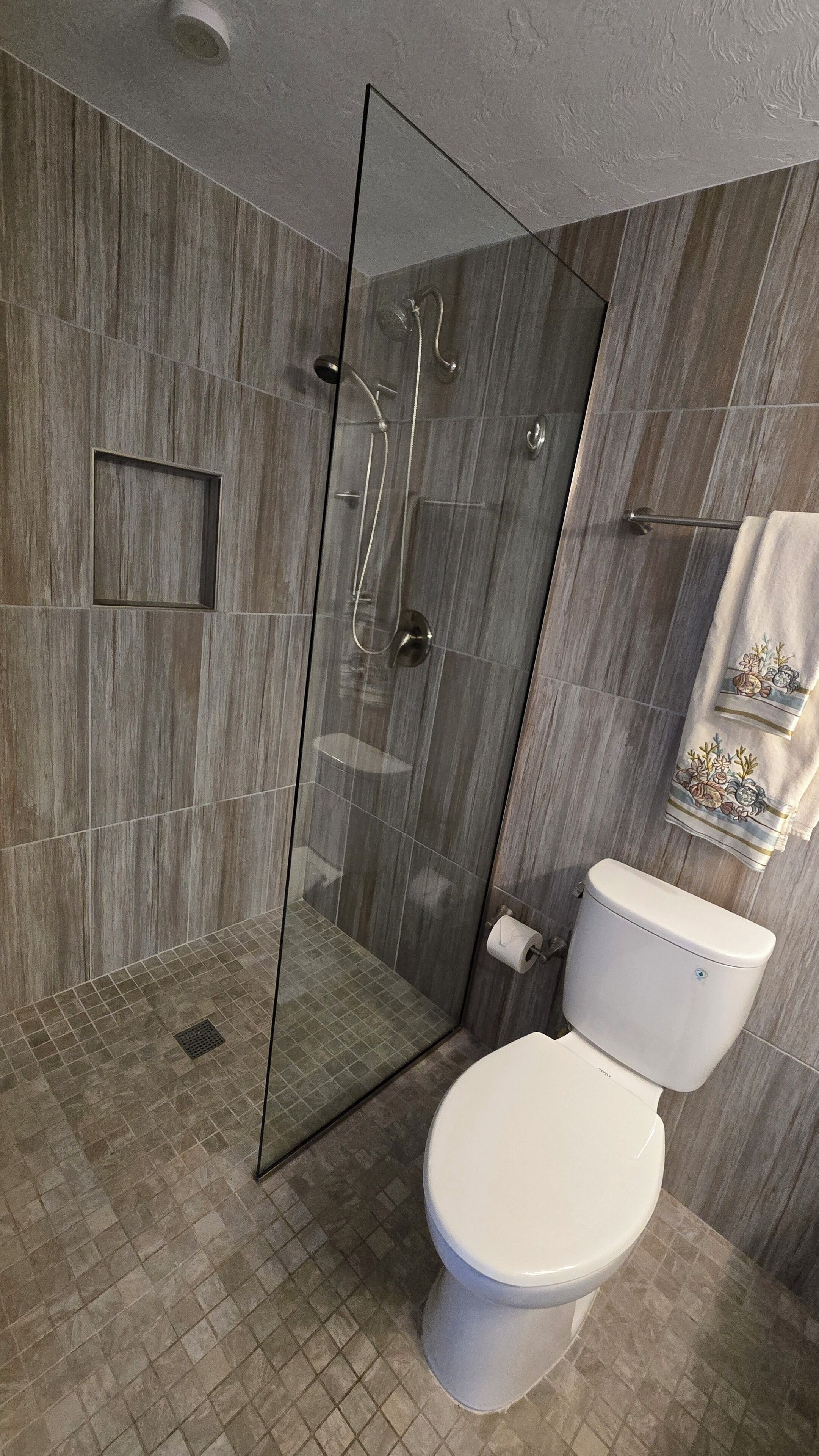 Bathtub, hair dryer, towels, soap