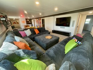 Smart TV, fireplace, video games, foosball