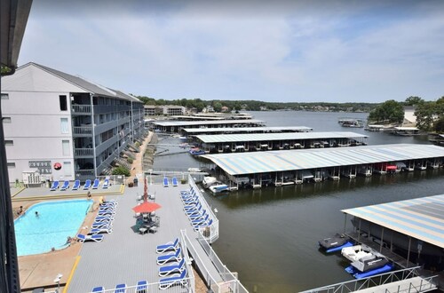 BEAUTIFUL Updated Condo ON THE WATER!Lake main channel & pool views!! Boat Slip!