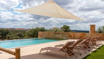 Outdoor pool, open 10:00 AM to 9:00 PM, pool umbrellas, sun loungers