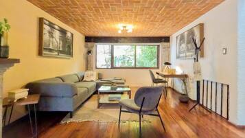 Exclusive House | Living area | 55-inch LED TV with digital channels, TV, smart speakers