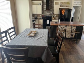 Dining - Modern Home in Quiet Mobile Home Community convenient to Town/Campus - King Bed (College Station)