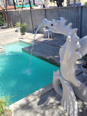 Indoor pool, open 9:30 AM to 10:00 AM, pool umbrellas - Pousada Praia de Ponta Negra (Natal)