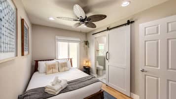 1 bedroom, desk, iron/ironing board, travel crib