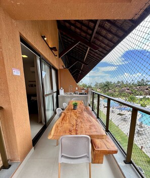 BX03I - 201 - Estrela do Mar 324587850 FLAT 201 EM FRENTE PISCINA | Outdoor dining