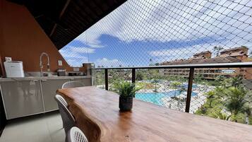 BX03I - 201 - Estrela do Mar 324587850 FLAT 201 EM FRENTE PISCINA | Outdoor dining