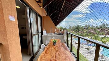 BX03I - 201 - Estrela do Mar 324587850 FLAT 201 EM FRENTE PISCINA | Outdoor dining