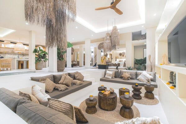 Basic Villa, Multiple Beds | Living room | 50-inch TV with digital channels, streaming services