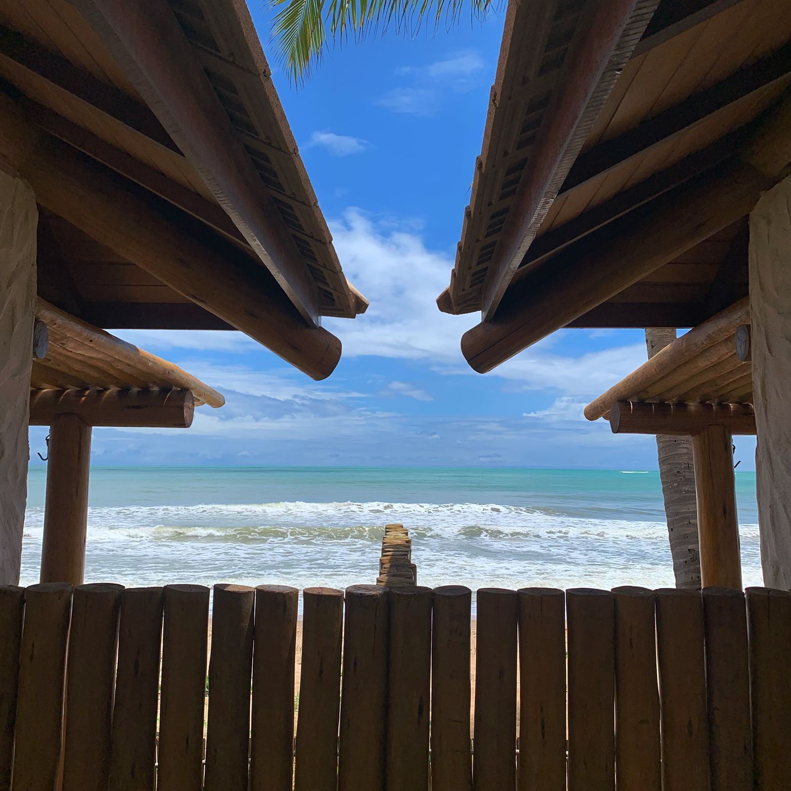 On the beach, white sand, sun-loungers, beach umbrellas