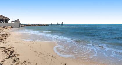 Deluxe canal-front home with pool, water-view patio, grill, & Cabana Club access