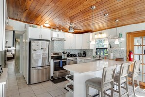 Fridge, microwave, oven, stovetop - Deluxe canal-front home with pool, water-view patio, grill, & Cabana Club access (Key Colony Beach)